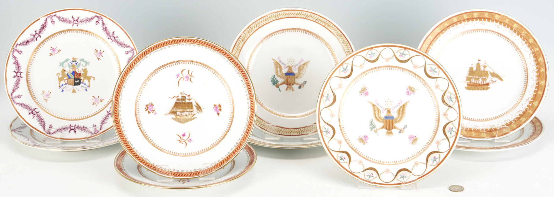 Lot 10: 9 Chinese Export Armorial Porcelain Plates