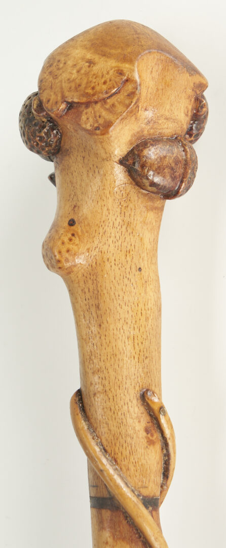 Lot 176: 2 Carved Walking Sticks incl. Glass Eye Figural