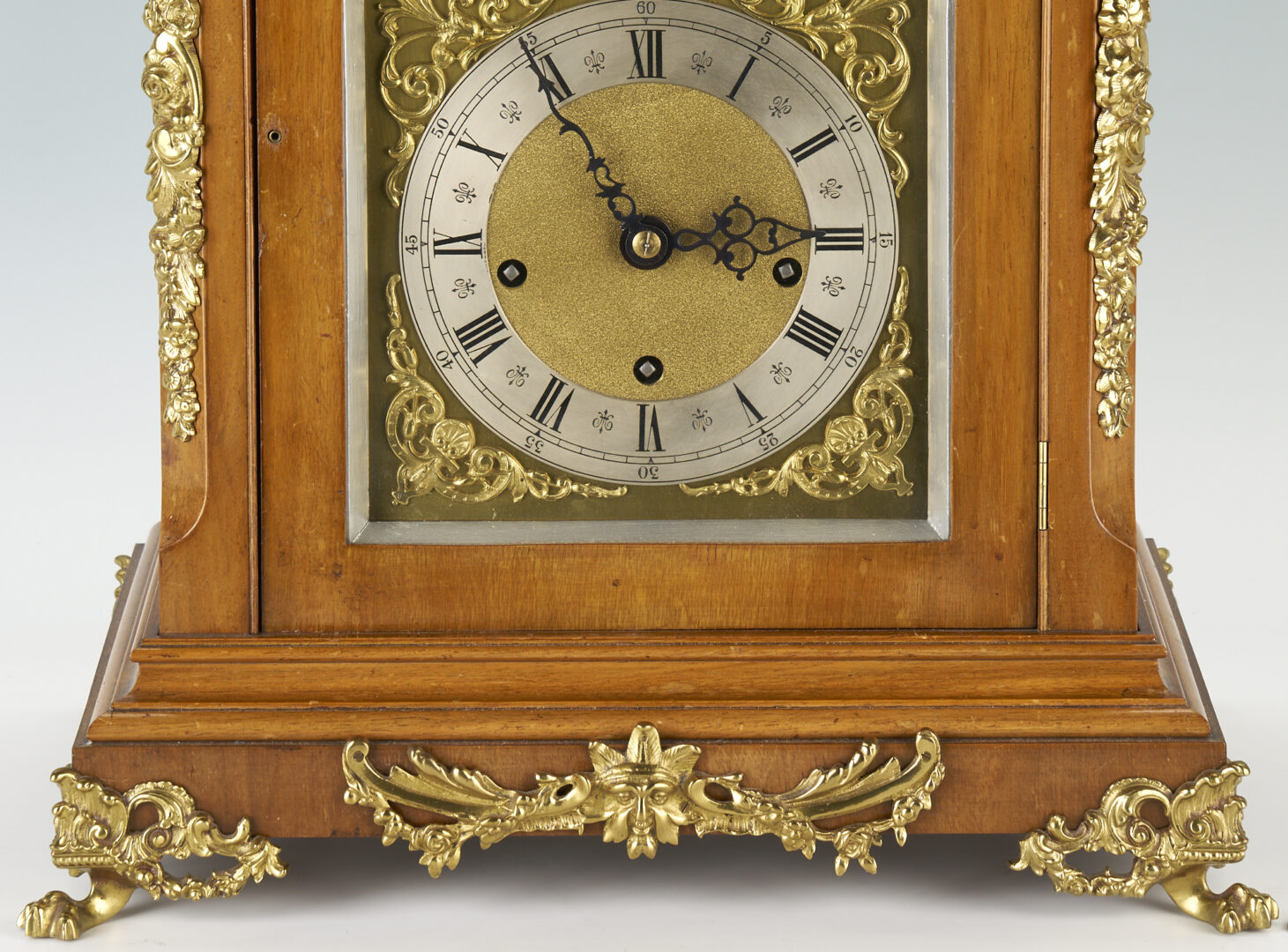 Lot 197: A Walnut and Brass Bracket Clock, Peerless