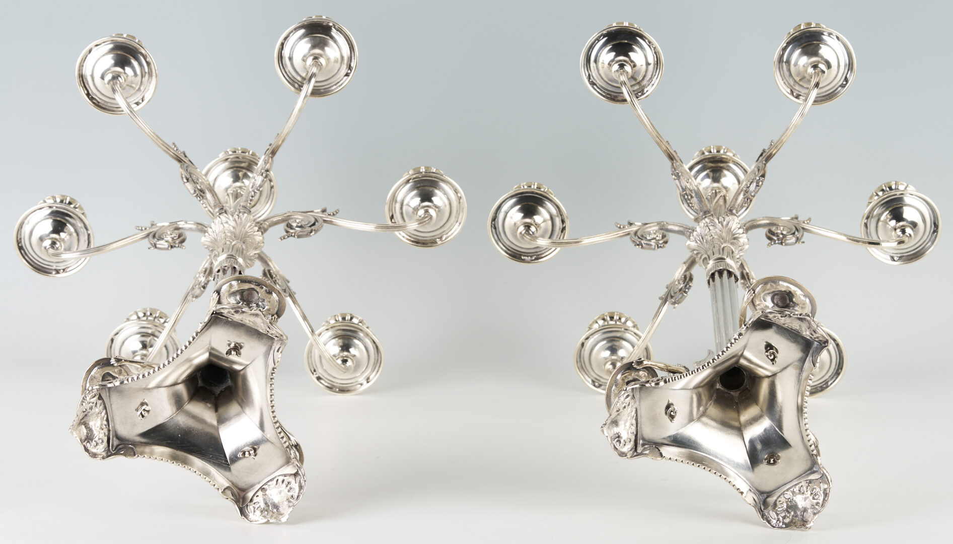 Lot 299: Pair of 7-Light Figural Silverplated Candelabra