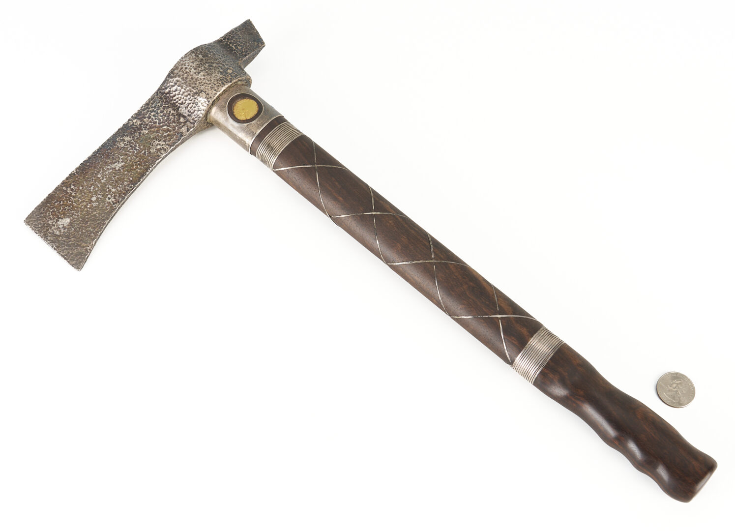 Lot 522: Silver Hatchet with Inlaid Gold Coin