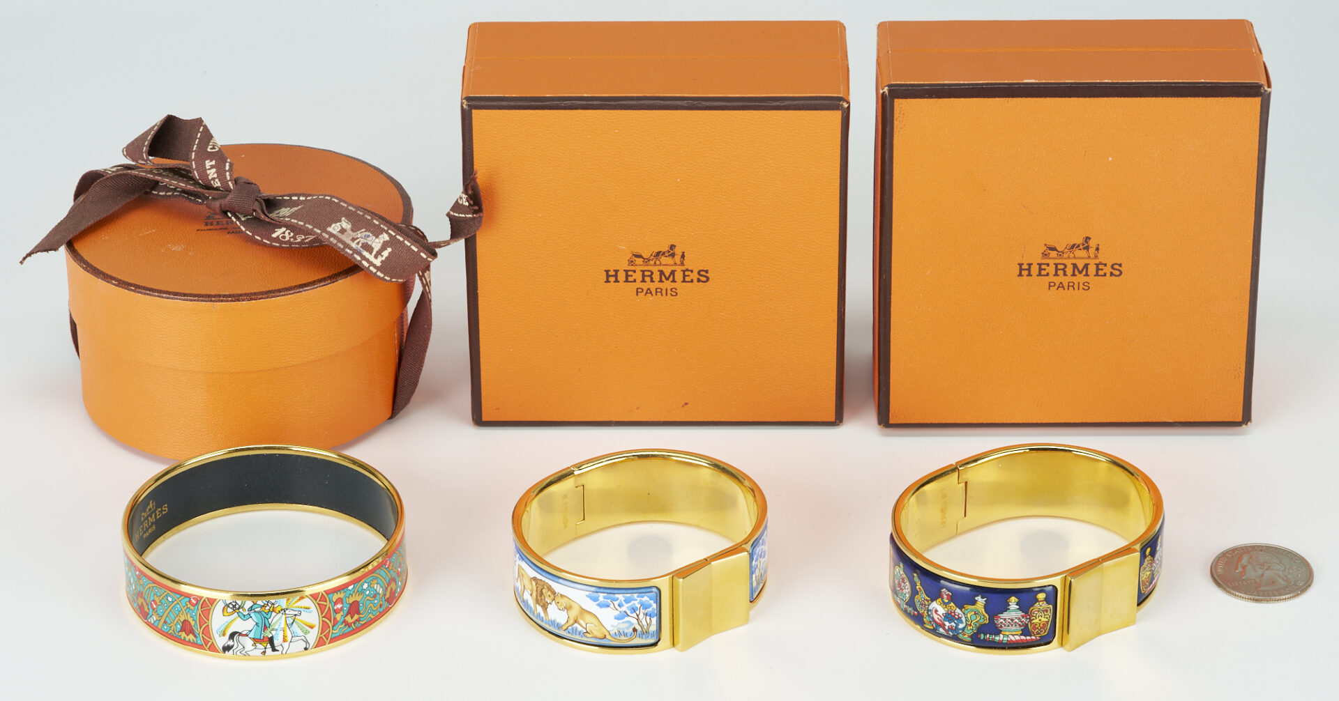 Lot 615: Group of Three Hermes Printed Enamel Bracelets