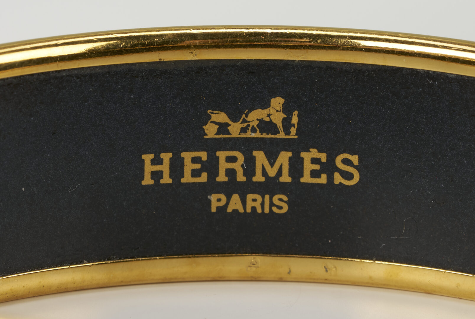 Lot 615: Group of Three Hermes Printed Enamel Bracelets