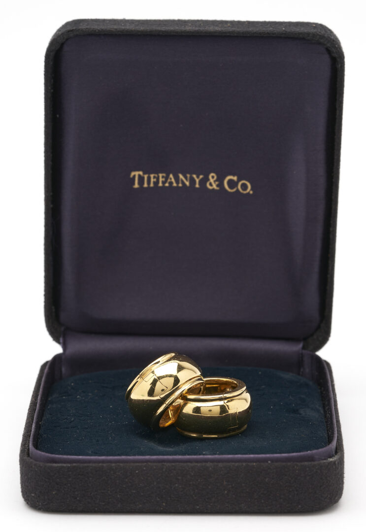 Lot 671: 18K Tiffany & Co. Huggie Hoop Earrings
