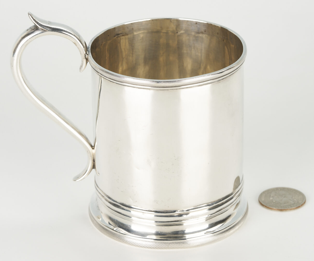 Lot 73: New Orleans coin silver mug, Dillon and Hovel