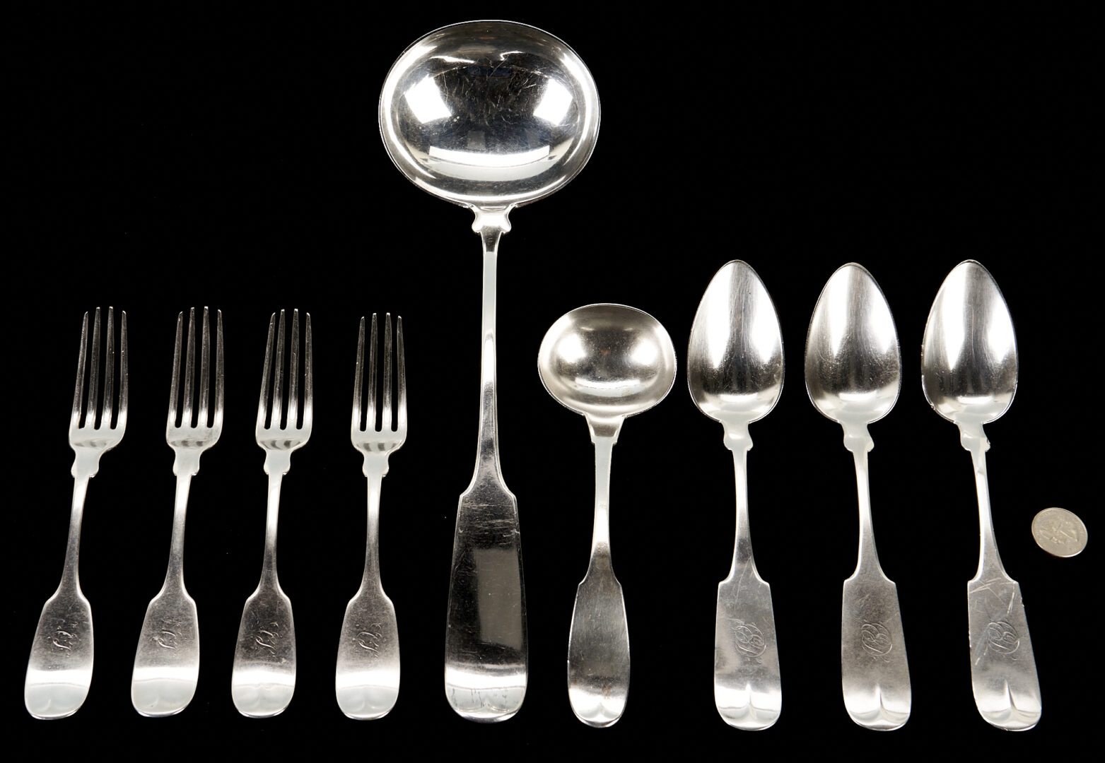 Lot 74: New Orleans Coin Silver Ladles, forks and spoons – 9 pcs.